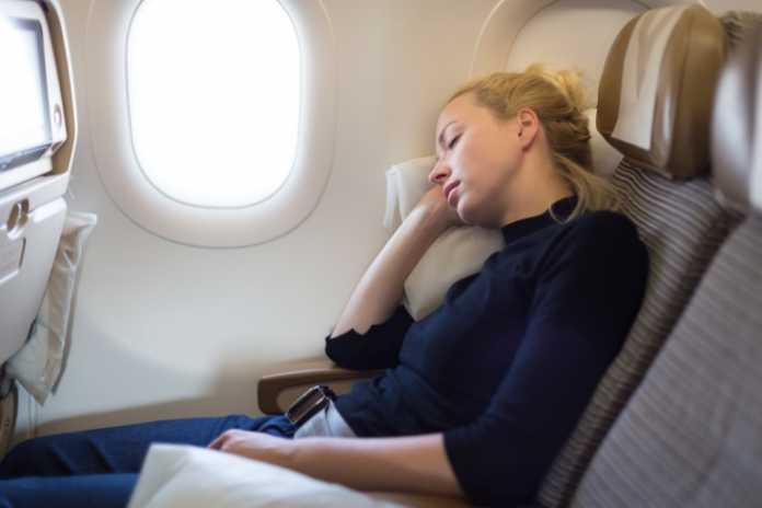 Best Way to Sleep on a Plane 11 Tips - Mindful Travel Experiences