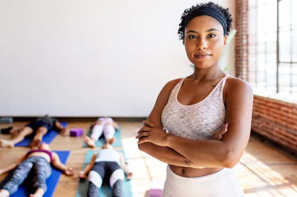 lying down meditation in yoga class