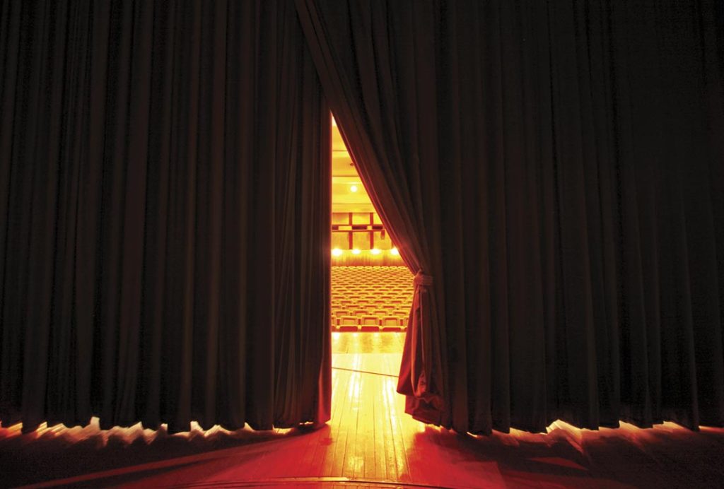 Theatre seats through curtains